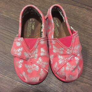 Tom’s pink and metallic silver butterfly toddler 6 slip on shoes